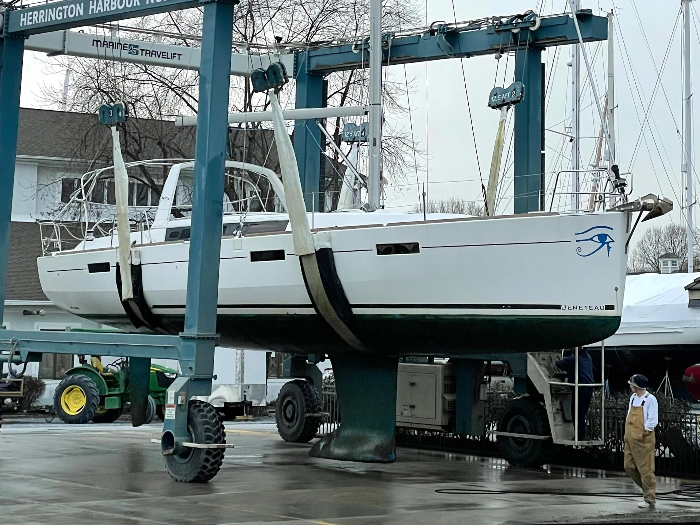 sailboat in travel lift slings
